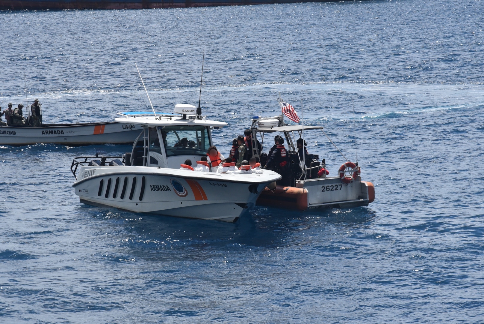 Coast Guard Cutter Thetis crewmembers repatriate 60 migrants to Santo Domingo, Dominican Republic, March 30, 2026.  The Thetis and a Customs and Border Protection aircrew interdicted an unlawful migration voyage vessel transporting 54 Haitians and six Dominican Republic nationals in Mona Passage waters off Puerto Rico, March 27, 2026. (U.S. Coast Guard photo)
