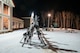 A stack of skis stand upright outside the welcome center at Bottineau Winter Park, North Dakota, March. 7, 2026. The easy to navigate park contains eight alpine trails ranging from beginner to expert. (U.S. Air Force photo by Airman Joseline Chacon Monterroso)