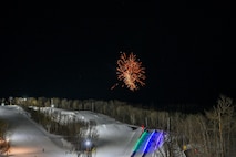 Fireworks light up the night sky at Bottineau Winter Park, North Dakota, March. 7, 2026. Bottineau Winter Park operates as a nonprofit, focused on strengthening the community through outdoor recreation. (U.S. Air Force photo by Airman Joseline Chacon Monterroso)