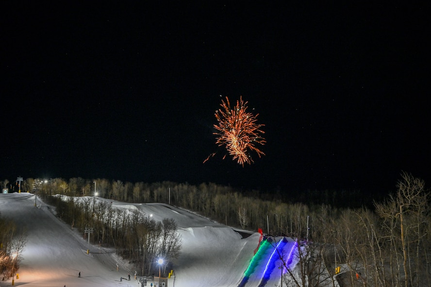 Fireworks light up the night sky at Bottineau Winter Park, North Dakota, March. 7, 2026. Bottineau Winter Park operates as a nonprofit, focused on strengthening the community through outdoor recreation. (U.S. Air Force photo by Airman Joseline Chacon Monterroso)