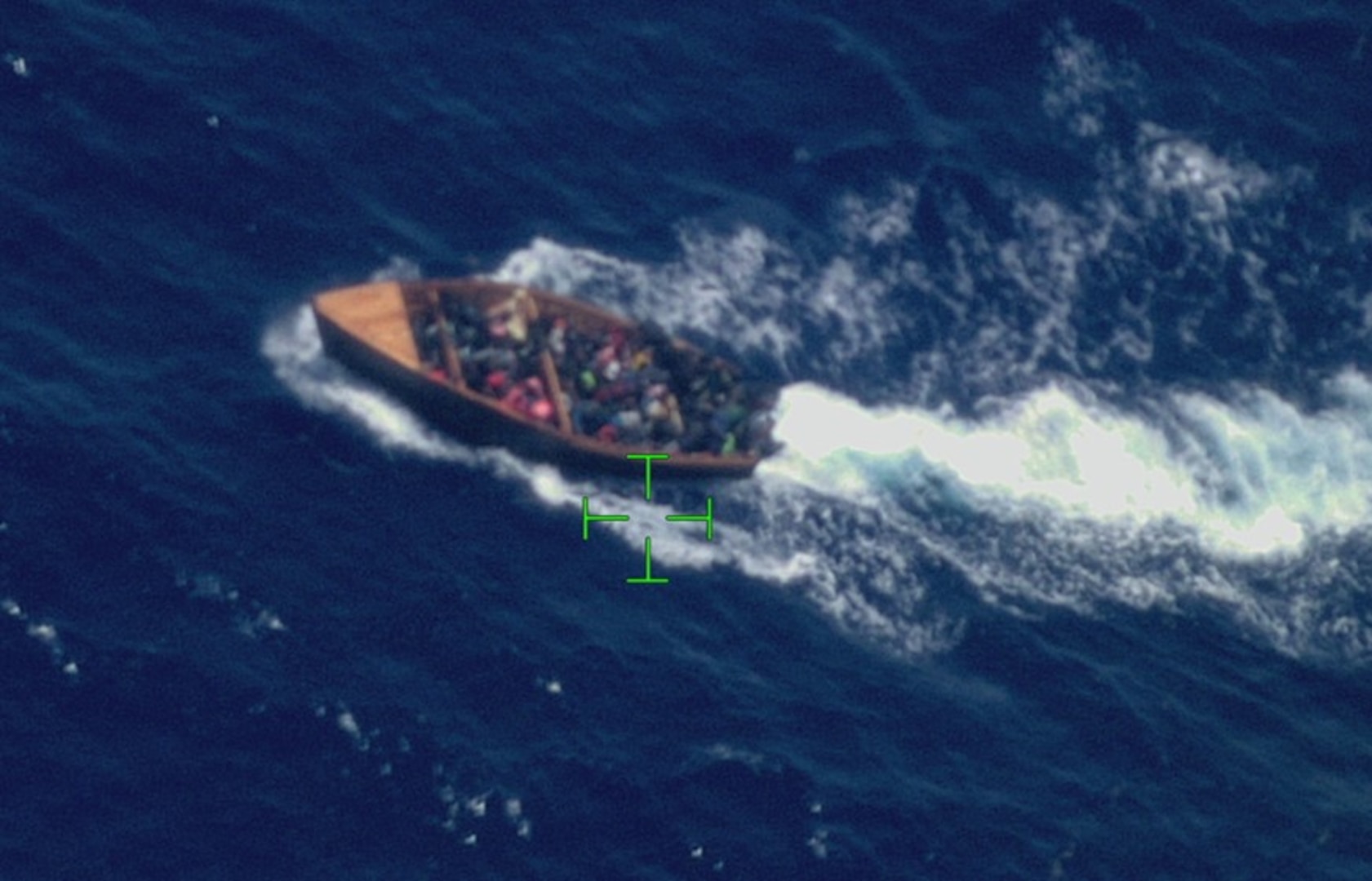 Coast Guard Cutter Thetis and a Customs and Border Protection multi-role enforcement aircraft crew interdict an unlawful migration voyage vessel in Mona Passage waters off Puerto Rico, March 27, 2026.  Thetis crewmembers repatriated 60 migrants and transferred them to Dominican Republic Navy authorities in Santo Domingo, Dominican Republic, March 30, 2026.  (U.S. Coast Guard photo)