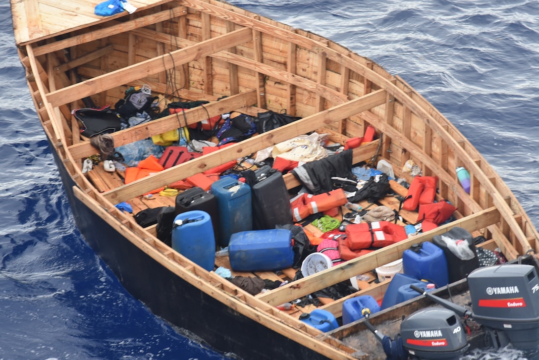 Coast Guard Cutter Thetis and a Customs and Border Protection multi-role enforcement aircraft crew interdict an unlawful migration voyage vessel in Mona Passage waters off Puerto Rico, March 27, 2026.  Thetis crewmembers repatriated 60 migrants and transferred them to Dominican Republic Navy authorities in Santo Domingo, Dominican Republic, March 30, 2026.  (U.S. Coast Guard photo)