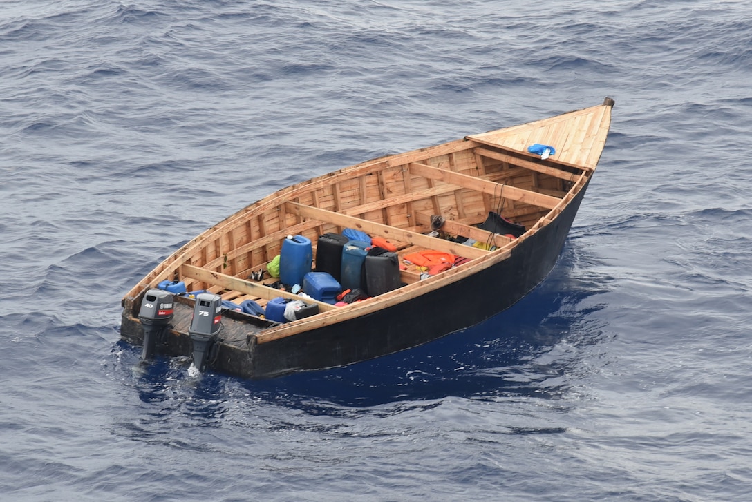 Coast Guard Cutter Thetis and a Customs and Border Protection multi-role enforcement aircraft crew interdict an unlawful migration voyage vessel in Mona Passage waters off Puerto Rico, March 27, 2026.  Thetis crewmembers repatriated 60 migrants and transferred them to Dominican Republic Navy authorities in Santo Domingo, Dominican Republic, March 30, 2026.  (U.S. Coast Guard photo)