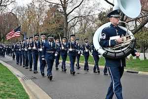 Air Force Band and honor guard members march