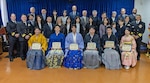 YOKOSUKA, Japan (March 20, 2026) — Graduating fellows, leadership, distinguished guests and family members pose for a group photo following the Japanese National Physician Postgraduate Education Program graduation ceremony at U.S. Naval Hospital Yokosuka. U.S. Naval Hospital Yokosuka graduated six physicians from the yearlong program, strengthening bilateral medical readiness and patient care across the Indo-Pacific. (U.S. Navy photo by Daniel Taylor/USNMRTC Yokosuka Public Affairs)