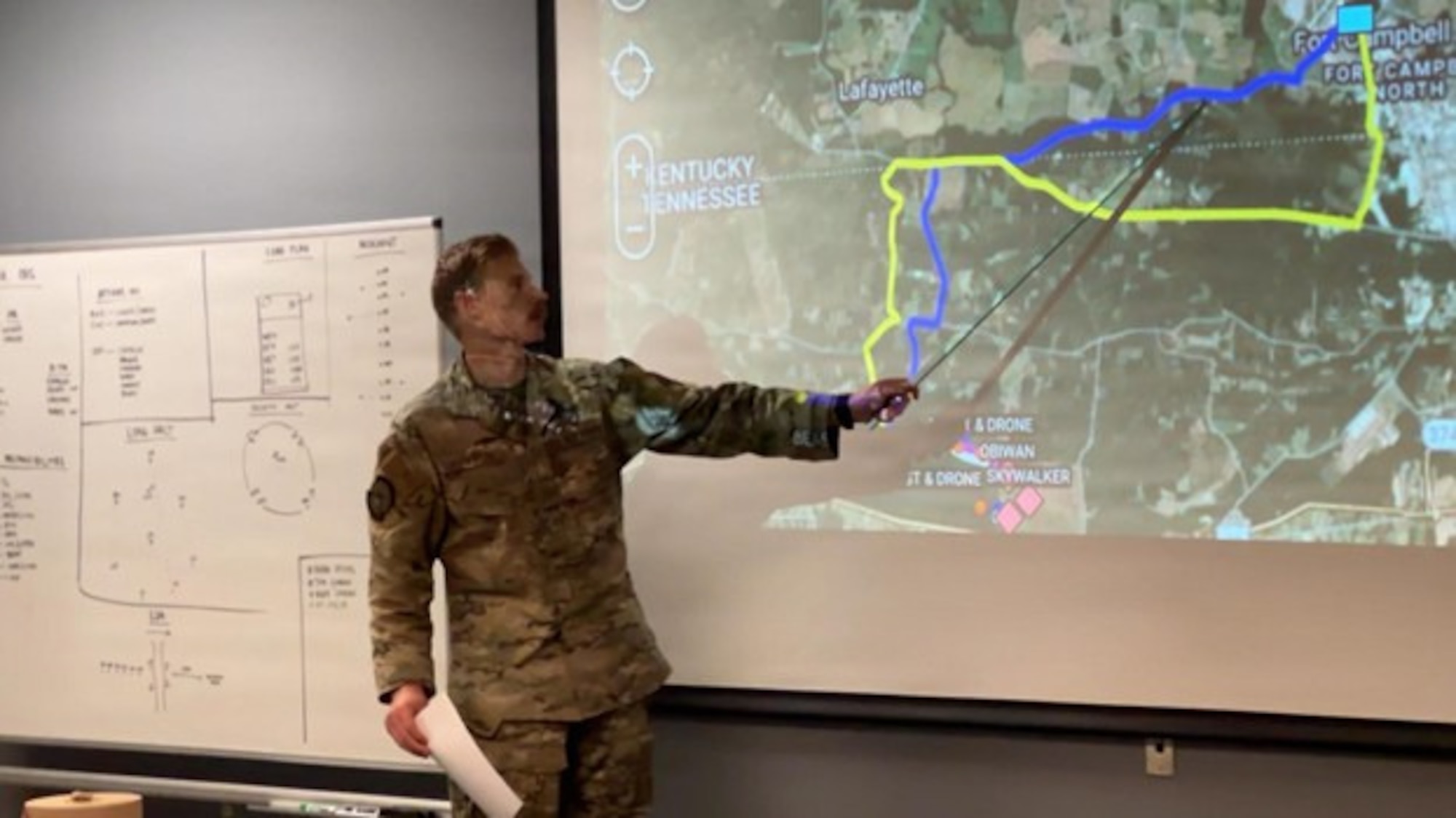 A Tactical Air Control Party Airman with the 19th Air Support Operations Squadron briefs a mission route during a Special Operations Warfare Ground Evaluation