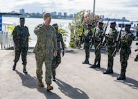 Adm. George Wikoff salutes the welcome party at Kenya Navy Base Mtongwe.