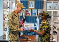 Adm. George Wikoff and Major General Paul Otieno pose for a photo during a visit to Kenya Navy Base Mtongwe.