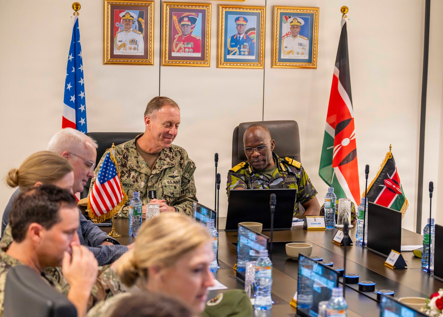 Adm. George Wikoff and Major General Paul Otieno receive a brief from Kenya Navy Marine Commandos in Mombasa.