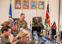 Adm. George Wikoff and Major General Paul Otieno receive a brief from Kenya Navy Marine Commandos in Mombasa.