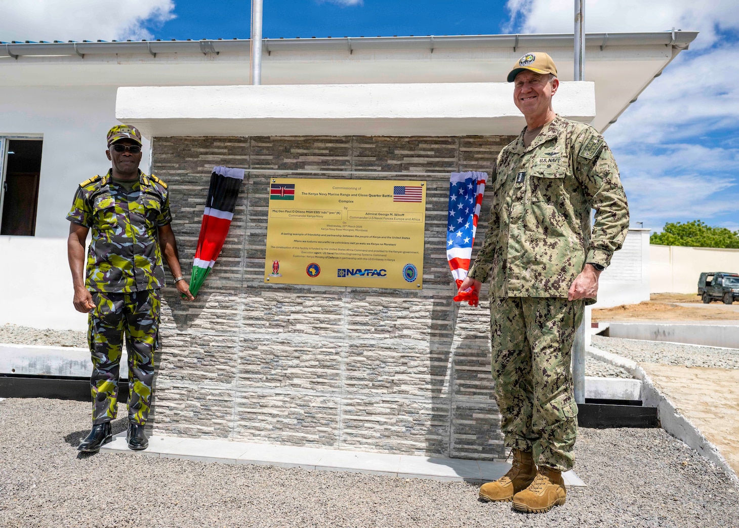 Adm. George Wikoff and Major General Paul Otieno pose for a photo at the Close Quarters Battle Facility Inauguration ceremony.