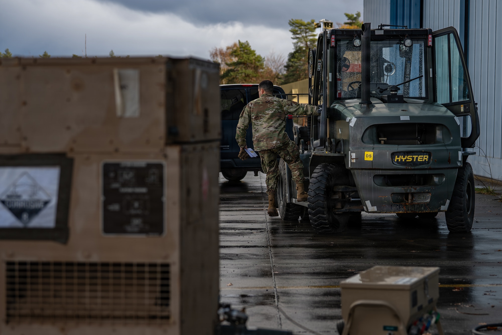 U.S. Air Force Senior Airman Joshua Lopez-Gonzales, 86th Vehicle Readiness Squadron ground transportation support, lifts himself into a forklift at Ramstein Air Base, Germany, March 25, 2026.