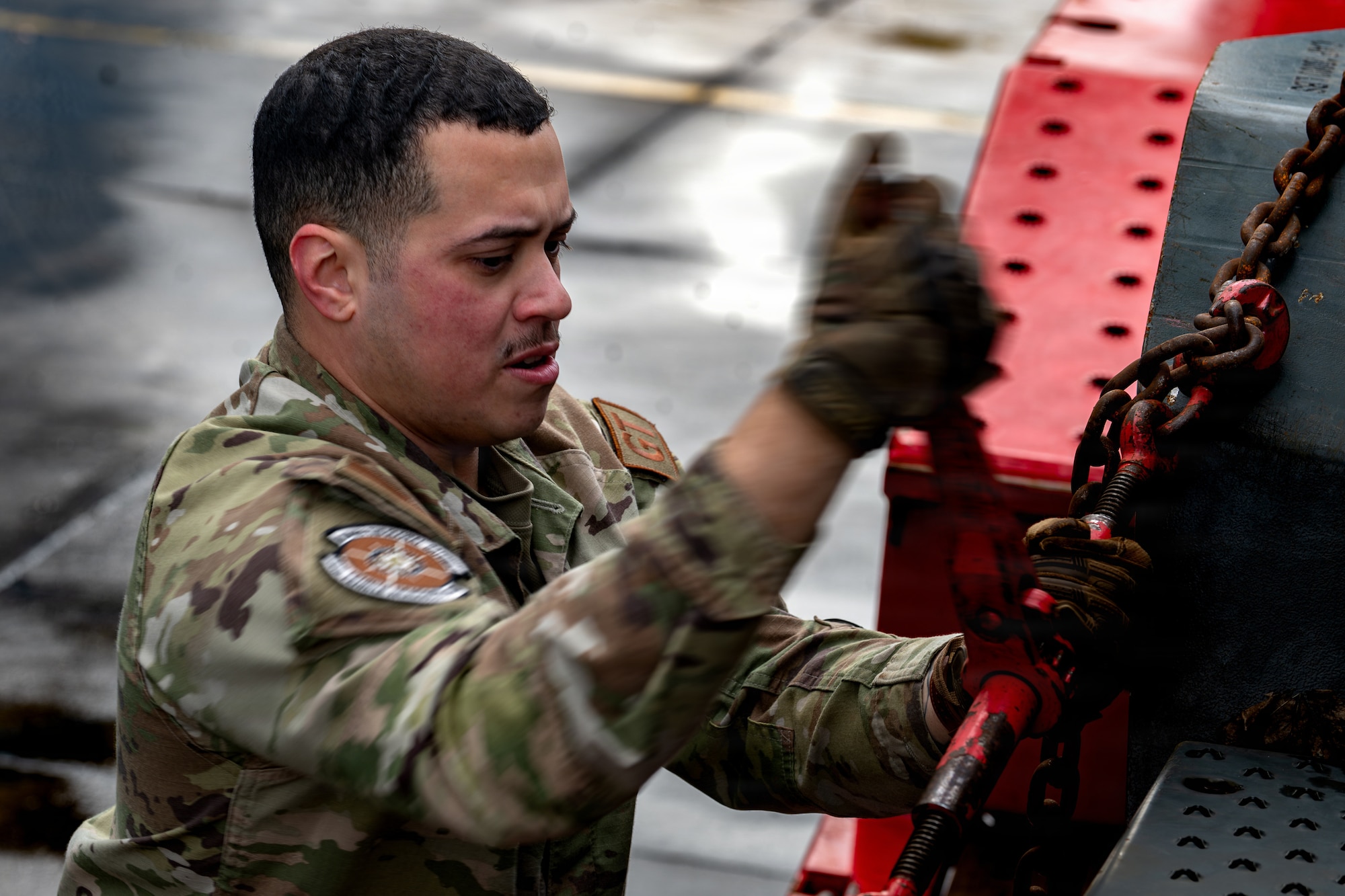 U.S. Air Force Senior Airman Joshua Lopez-Gonzales, 86th Vehicle Readiness Squadron ground transportation support, secures a forklift onto a trailer at Ramstein Air Base, Germany, March 25, 2026.