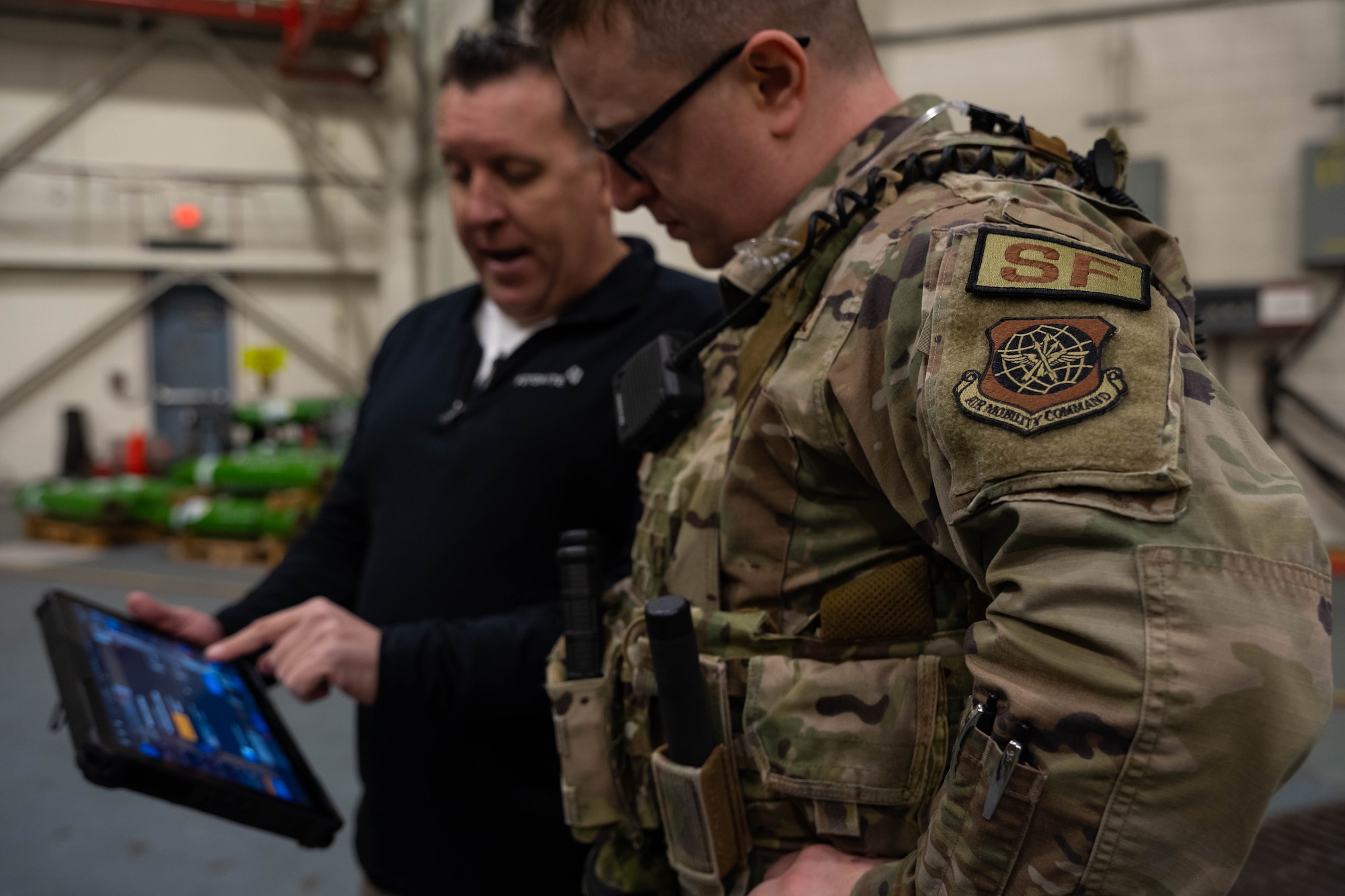 A security forces Airmen learns how to operate tethered drones.