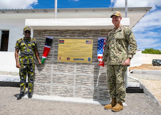 Adm. George Wikoff and Major General Paul Otieno pose for a photo at the Close Quarters Battle Facility Inauguration ceremony.