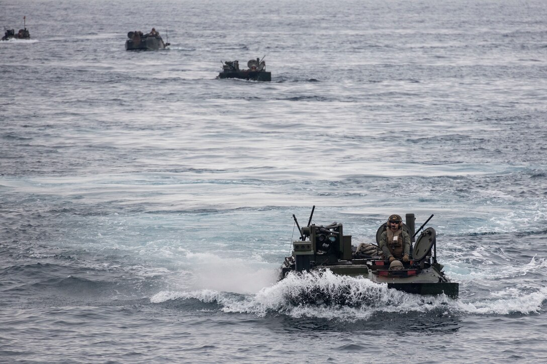 U.S. Marines with Charlie Company, 3rd Assault Amphibian Battalion, conduct certification training with an Amphibious Combat Vehicle aboard the USS Somerset