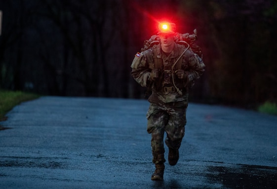 Georgia State Defense Force Pfc. Patrick Railey representing the Georgia State Defense Force runs during the Ruck March event of the 2026 Georgia Army National Guard State Best Warrior Competition at the Catoosa Volunteer Training Site, Ringgold, Georgia, Mar. 12, 2026. The competition demonstrates the readiness and lethality of the Georgia DoD and country of Georgia Defence Force soldiers by testing the competitors with physical fitness assessments, written exams, and other warrior tasks and battle drills. (U.S. Army National Guard photo by Staff Sgt. Alexander Norred)
