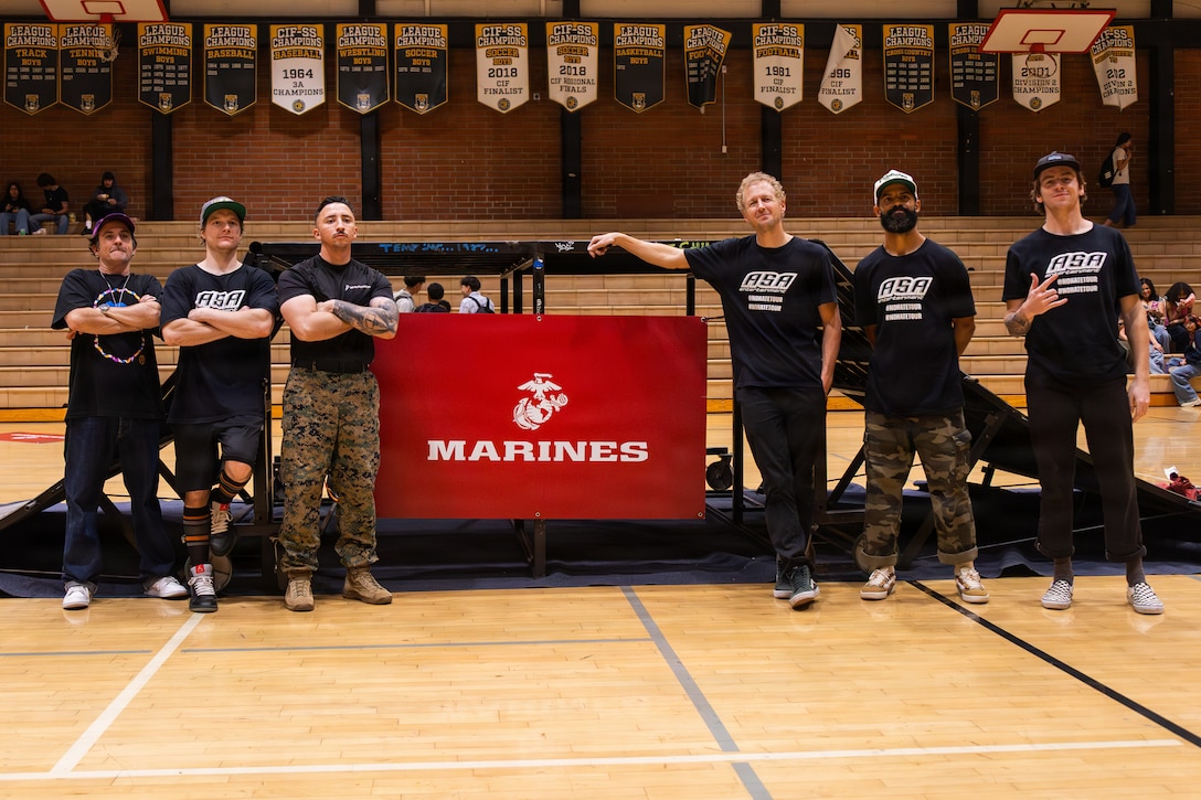 U.S. Marine Corps Staff Sgt. Luciano Pulido, a canvassing recruiter with Recruiting Sub-Station Fontana, Recruiting Station Riverside, poses for a photograph during an Action Sports Association No Hate Tour event at Rubidoux High School in Riverside, California, Feb. 27, 2026. The ASA No Hate Tour, now in its 26th year, is an educational program that uses the energy and excitement of action sports to deliver critical bullying prevention tools, techniques, and information to students. (U.S. Marine Corps photo by Sgt. Bruin Largent)