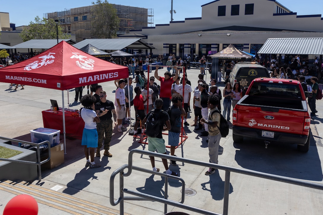 U.S. Marines with Recruiting Sub-Station Upland, Recruiting Station Riverside, interact with students during a Military and First Responders Day at Rancho Cucamonga High School in Rancho Cucamonga, California, March 19, 2026. The Military and First Responders Day highlighted a wide range of career opportunities, giving students firsthand insight into service-driven professions and inspiring them to explore paths in the military, law enforcement, fire service and emergency response. (U.S. Marine Corps photo by Cpl. Osmar Gutierrez)