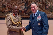 U.S. Air Force Maj. Gen. Gary Keefe, the adjutant general of the Massachusetts National Guard, right, and Kenyan Defence Forces, or KDF, Lt. Gen. David Ketter, the commander of the Kenyan Army, shake hands during the African Land Forces Summit in Rome, Italy, March 23, 2026.
