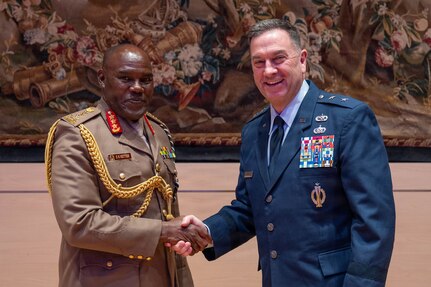 U.S. Air Force Maj. Gen. Gary Keefe, the adjutant general of the Massachusetts National Guard, right, and Kenyan Defence Forces, or KDF, Lt. Gen. David Ketter, the commander of the Kenyan Army, shake hands during the African Land Forces Summit in Rome, Italy, March 23, 2026.