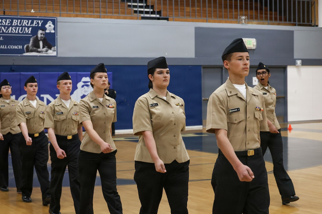 Naval Junior Reserve Officers' Training Corps cadets with Carson High School compete in a drill competition during the Carson Drill Meet in Carson City, Nevada, March 7, 2026. The drill meet brought together eight schools competing in armed exhibition, unarmed exhibition, color guard and military knowledge questions. (U.S. Marine Corps photo by Cpl. Aimee Jordan)