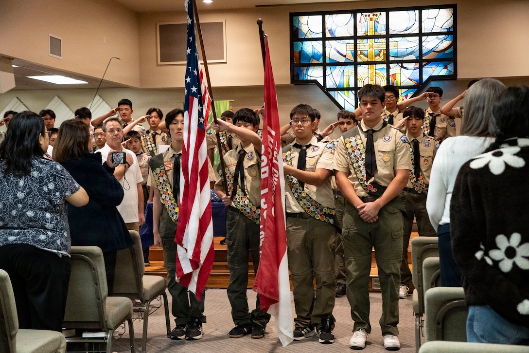 Members of Boy Scout Troop 139 present the colors during a Guardians of Old Glory community flag presentation ceremony in Alhambra, California, Jan. 12, 2026. Guardians of Old Glory presented 100 new American-made U.S. flags to Boy Scout Troop 139 to assist in replacing worn and weathered flags throughout their community. (U.S. Marine Corps photo by Sgt. Michele Clarke)
