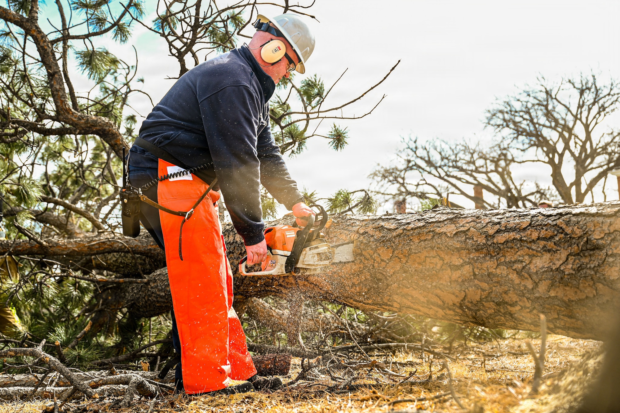 The 90 CES and other squadrons across the base quickly responded to effectively repair damage occurring on March 12, 2026, when winds reaching 92 MPH left severe damage to structures and landscaping. (U.S. Air Force photo by Senior Airman Mattison Cole)