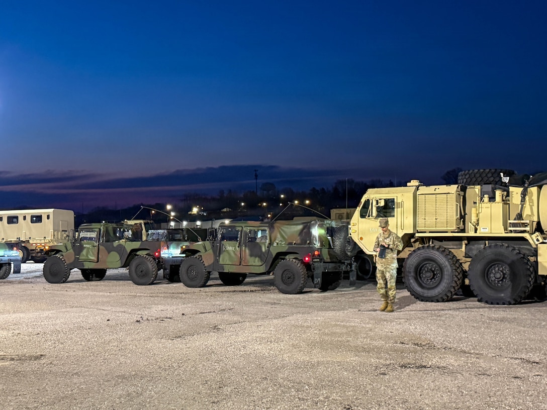 Vehicles of the 103rd Brigade Support Battalion, 38th Infantry Division Artillery, stage in the motor pool prior to departing for the Wendell H. Ford Regional Training Center, March 20, 2026.