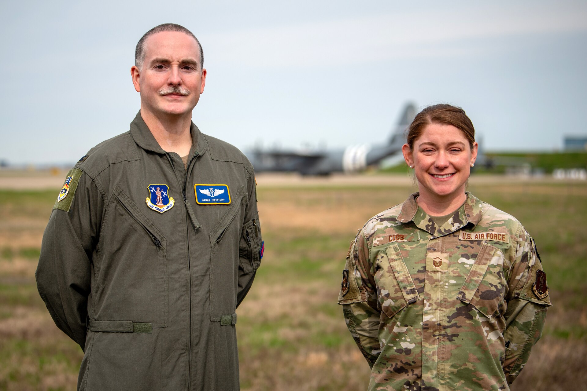 Master Sgt. Sarah Cobb (right), aerospace flight and operational medical technician for the 123rd Medical Group, and Lt. Col. Daniel Dierfeldt, chief of aerospace medicine for the 123rd Medical Group, saved the life of an Airman who suffered a cardiac arrest in August 2025, quickly assessing the situation and employing CPR at the Kentucky Air National Guard Base in Louisville Ky. Both were awarded the Kentucky Distinguished Service Medal for their actions. (U.S. Air National Guard photo by Master Sgt. Joshua Horton)