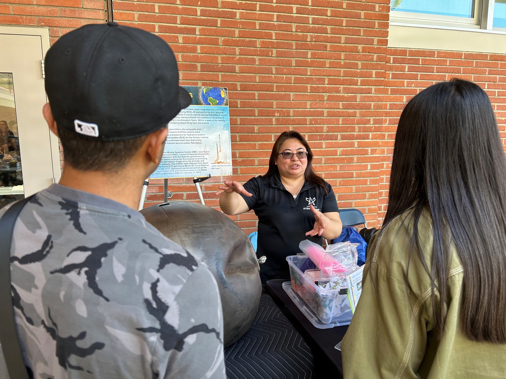 U.S. Space Force’s Space Systems Command (SSC) STEM Team participates in Onizuka Space Days at El Camino College in Torrance, Calif., on March 14, 2026.  Space Based Delta 3’s Heritage Center director Layesanna Rivera speaks with students at SSC's informational exhibit. Onizuka Space Days honors the memory of NASA astronaut and U.S. Air Force Test Pilot, Lt. Col. Ellison Onizuka. [USSF Photo by: Michiko Riley, SSC/PA]