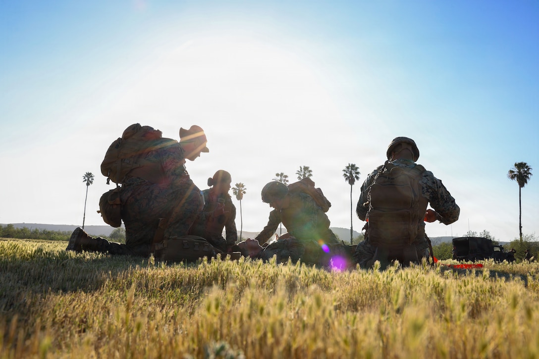 U.S. Marines with 9th Communication Battalion, I Marine Expeditionary Force Information Group, conduct a tactical combat casualty care training during a deployment readiness air confidence operation at Marine Corps Base Camp Pendleton, California, March 24, 2026.