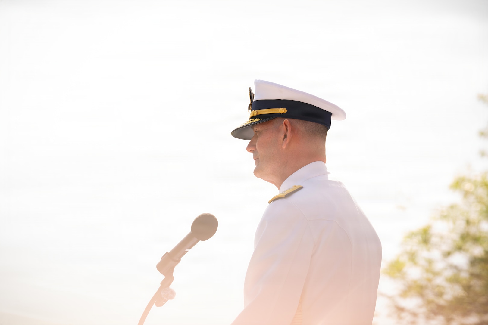Vice Adm. Joe Buzzella, commander of Coast Guard Pacific Area and Defense Force West delivers remarks during his assumption of command ceremony, March 26, 2026, at Coast Guard Island, Alameda, California. As Pacific Area commander, Buzzella will lead Coast Guard operations throughout the Indo Pacific, the Polar Regions and Western Hemisphere, focusing on enhancing operational readiness, strengthening international partnerships, and advancing strategic priorities in support of national security objectives. (U.S. Coast Guard photo by Petty Officer 3rd Class Kenneth Wiese)