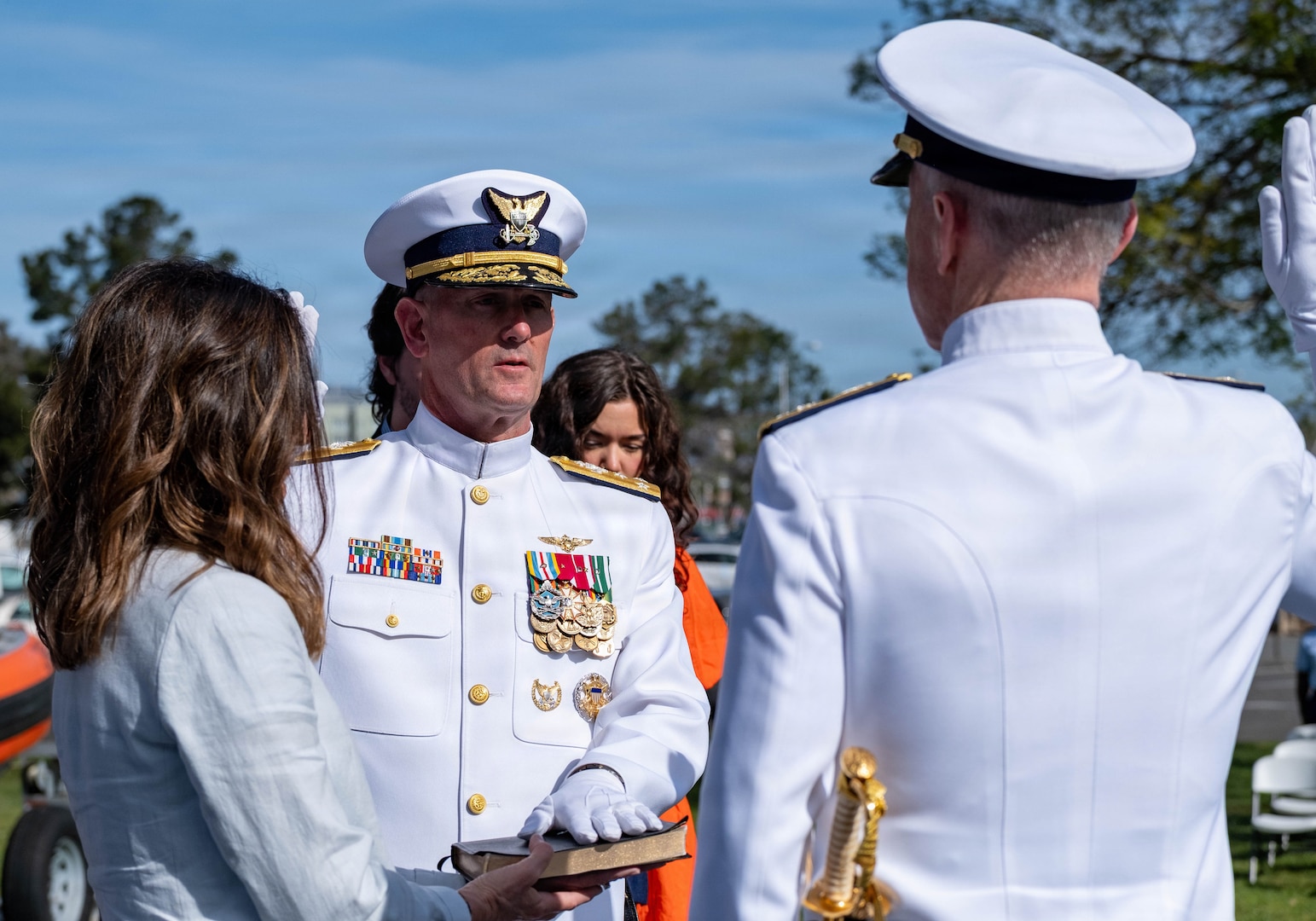 Vice Adm. Joe Buzzella recites the oath of office during an assumption of command ceremony, March 26, 2026, at Coast Guard Island, Alameda, California. The ceremony formally marked Vice Adm. Joe Buzzella as the commander of Coast Guard Pacific Area and Defense Force West. (U.S. Coast Guard photo by Petty Officer 3rd Class Charlie Valor)