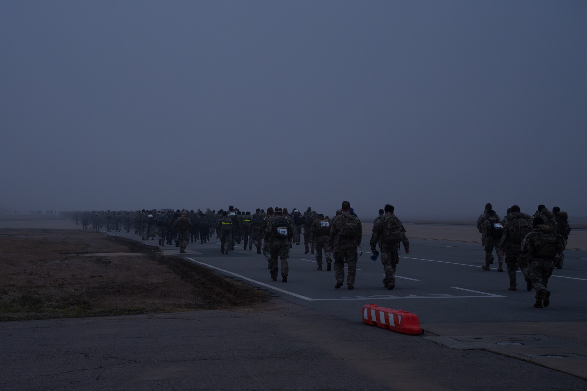 Service members participate in a 30km ruck.