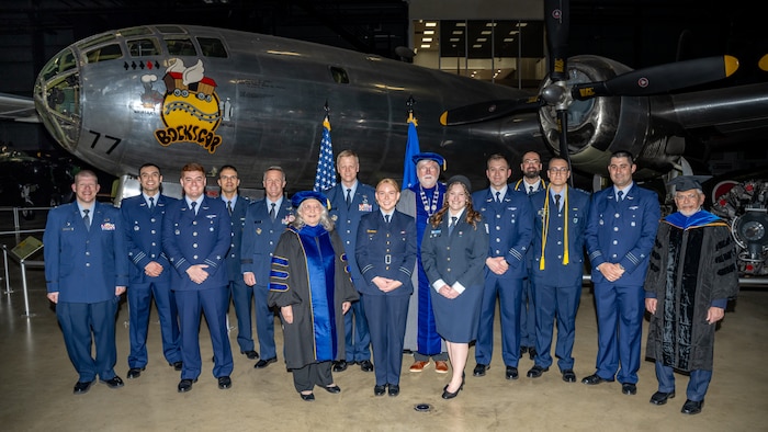 Air University’s Air Force Institute of Technology graduates and faculty pose for a photo at Wright-Patterson Air Force Base, Ohio, March 30, 2026.
