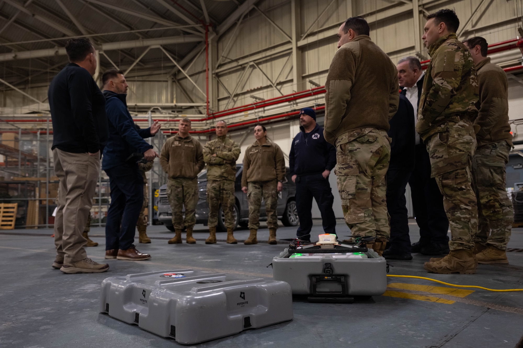 A security forces Airmen learns how to operate tethered drones.