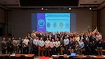 Attendees pose for a group photo at the U.S. Forces Japan Law Enforcement Symposium April 22, 2026, at the New Sanno Hotel in Tokyo, Japan.