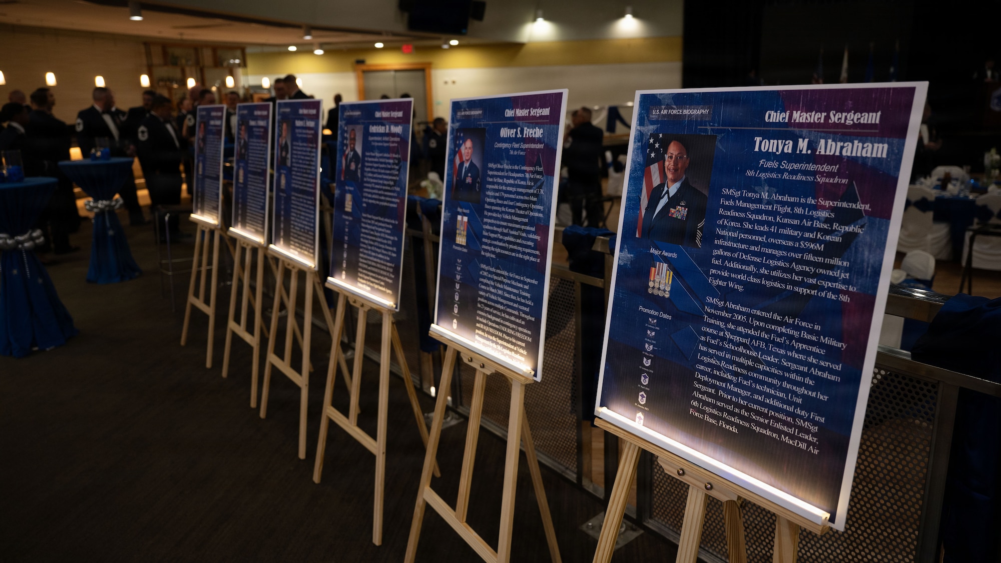 Biographies of U.S. Air Force chief master sergeant selects are on display during a chief master sergeant recognition ceremony at Osan Air Base, Republic of Korea, April 24, 2026. The recognition underscores the critical role Chiefs play in advising commanders and leading the enlisted force. (U.S. Air Force photo by Senior Airman Rome Bowermaster)