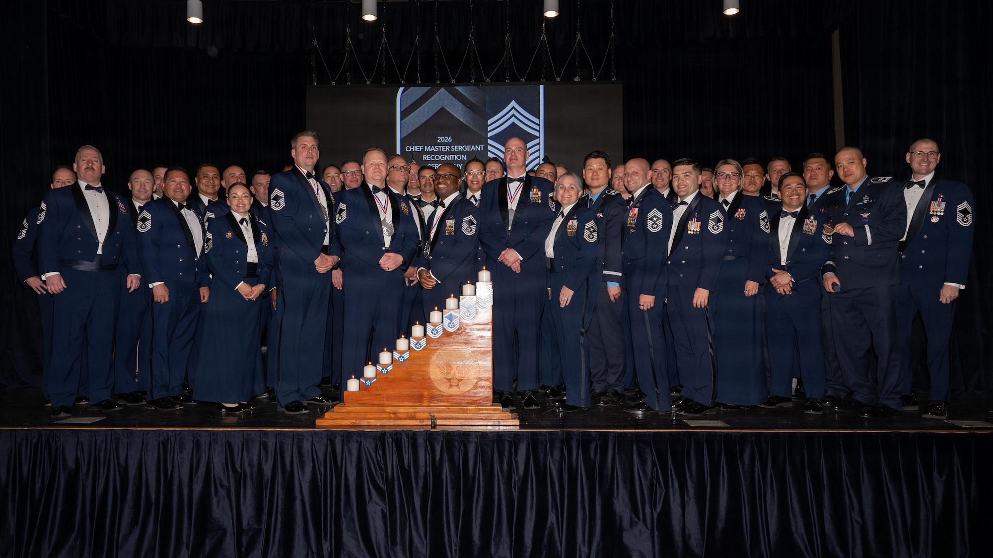 U.S. Air Force airmen assigned to the 51st Fighter Wing and Republic of Korea airmen, pose for a group photo during a chief master sergeant recognition ceremony at Osan Air Base, Republic of Korea, April 24, 2026. The recognition marks a transition into greater responsibility as chiefs continue to lead, mentor and advocate for Airmen. (U.S. Air Force photo by Senior Airman Rome Bowermaster)