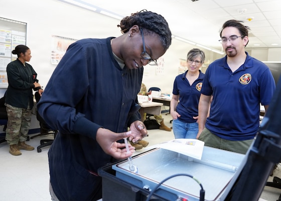 JOINT BASE SAN ANTONIO – FORT SAM HOUSTON – (April 16, 2026) – U.S. Army Staff Sgt. McKeitha Williams, of Henderson, N.C., a dental specialist instructor assigned to the Echo Co., 264th Medical Training Battalion, participated in a usability test of the Rugged Ozone Sterilization System Model M1 (ROSS M1) at the Medical Education and Training Campus. During the month of April, NAMRU San Antonio research engineers visited with dental and veterinary science instructors to test the usability of the ROSS M1. The ROSS M1 is a portable device with the capability of sterilizing medical instruments on the battlefield or in austere environments which will help in the treatment and recovery of wounded warfighters. Navy Medicine Research & Development (NMR&D) employs highly qualified medical researchers and works alongside a wide range of research and development partners to keep abreast of best practices and advances in medical knowledge on behalf of Navy Medicine to increase warfighter lethality. NAMRU San Antonio, part of NMR&D, conducts gap-driven combat casualty care, craniofacial, and directed energy research in support of Navy, Marine Corps and joint U.S. warfighter health readiness and lethality while engaged in routine and expeditionary operations. (U.S. Navy photo by Burrell Parmer, NAMRU San Antonio/Released)