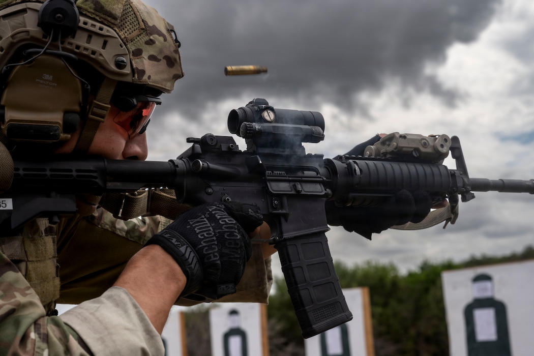 A Tactical Air Control Party Airman with Detachment 2, 6th Combat Training Squadron, fires an M4 carbine during small arms qualification at Joint Base San Antonio–Camp Bullis, Texas, April 10, 2026. Training ensures combat readiness across firing positions and distances. (U.S. Air Force photo by Melissa Hydrick)