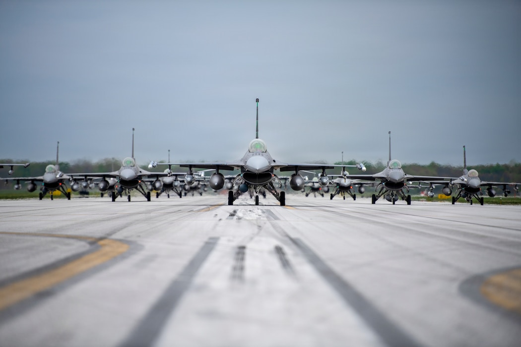 F-16 Fighting Falcons assigned to the 180th Fighter Wing conduct an elephant walk during a Combat Readiness Inspection in Swanton, Ohio, April 26, 2026. The inspection evaluates unit capability, efficiency and mission readiness. (U.S. Air National Guard photo by Senior Master Sgt. Beth Holliker)