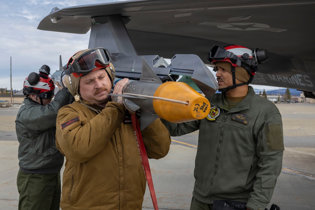 U.S. service members unload ordnance from an F-35B Lightning II during exercise Red Flag-Alaska 26-1 at Eielson Air Force Base, Alaska, April 28, 2026. Red Flag-Alaska is a Pacific Air Forces-led exercise designed to simulate complex scenarios in a realistic training environment, providing unique opportunities to integrate joint and coalition forces into multilateral training, enhancing our ability to respond to contingencies in the region. (U.S. Marine Corps photo by Lance Cpl. Bryan Giraldo)