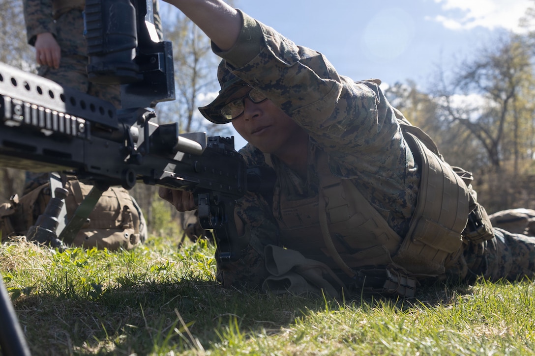 U.S. Marine Corps Lance Cpl. Charlito Ferrera, an ammunition technician with Combat Logistics Battalion 24, Combat Logistics Regiment 27, 2nd Marine Logistics Group, executes M240B machine gun operating procedures during exercise Aurora 26 in Kvarn, Sweden, April 28, 2026. CLB-24 conducted drills with M240B machine guns to enhance weapons proficiency and combat readiness. U.S. Marines and Sailors with 2nd MLG are participating in exercise Aurora as part of the larger U.S. Army-led Sword 26 series of linked multinational exercises, which directly supports NATO's Eastern Flank Deterrence Initiative concept, validates defense plans, builds a unified lethal force, and strengthens deterrence. Ferrera is a native of Texas. (U.S. Marine Corps photo by Lance Cpl. Talan Werner)