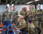 Maj. Gen. Daniel Boyack, adjutant general of the Utah National Guard, speaks with cyber specialists during a cyber demonstration in support of Exercise Wolverine at the Don A. Christiansen Water Treatment Plant in Orem, Utah, April 30, 2026. Exercise Wolverine showcases the Utah National Guard’s ability to respond to emerging threats in a dynamic security environment, ensuring forces remain ready to defend the homeland and support civil authorities in times of crisis. Photo by Airman Jacob Treanor.