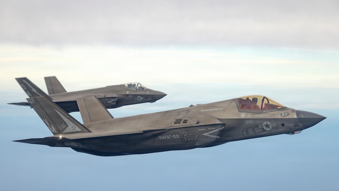 Two U.S. Marine Corps F-35C Lightning II aircraft assigned to Marine Aviation Weapons and Tactics Squadron One (MAWTS-1), fly over the Pacific Ocean during an air-to-air refueling exercise as part of Weapons and Tactics Instructor course 2-26, near Camp Pendleton, California, April 9, 2026. WTI is a seven-week training event hosted by MAWTS-1 which emphasizes operational integration of the seven functions of Marine aviation in support of the Marine Air Ground Task Force, Joint and Coalition Forces. (U.S. Marine Corps photo by Cpl. Seferino Gamez)