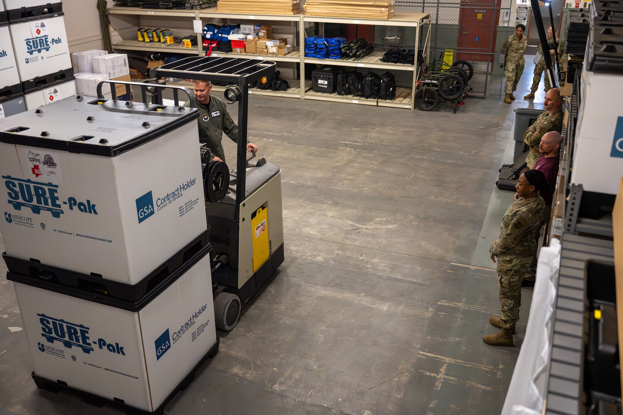 U.S. Air Force Col. Richard Kind, 97th Air Mobility Wing commander, operates a forklift during an Altus Medical Group “Boots on the Ground” immersion tour at Altus Air Force Base, Oklahoma, April 24, 2026. The tour highlighted the behind-the-scenes support required to keep the wing’s medical mission running safely and effectively. (U.S. Air Force photo by Airman 1st Class Nathan Langston)