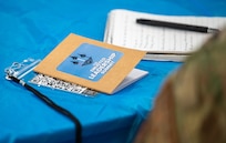 Leadership attendees received a lanyard and notetaking books.