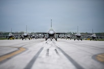 F-16 Fighting Falcons assigned to the 180th Fighter Wing conduct an elephant walk during a Combat Readiness Inspection in Swanton, Ohio, April 26, 2026. The inspection evaluates unit capability, efficiency and mission readiness. (U.S. Air National Guard photo by Senior Master Sgt. Beth Holliker)